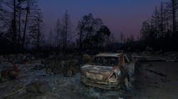 Charred remains of a structure and a vehicle hit by the CZU Lightning Complex fire in Boulder Creek, CA. Charred remains of a structure and a vehicle hit by the CZU Lightning Complex fire in Boulder Creek, CA.