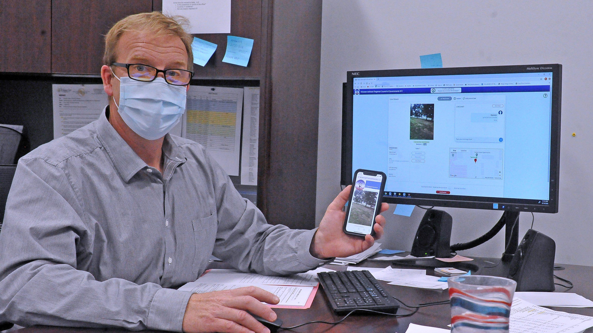 Rhodes Walter, director of the WARCOG dispatch center, shows how 911eye allows first responders and dispatchers to view an emergency scene before arriving to help better prepare them to respond.