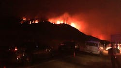 Three firefighters suffered minor injuries when they were caught in burnover conditions during the Bridger Foothills Fire near Bozeman, MT.