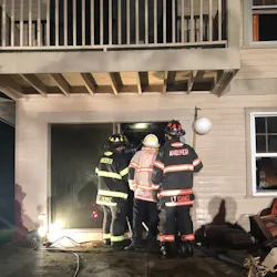Two Andover, MA, firefighters were injured battling a blaze that broke out at a three-story home early Monday.