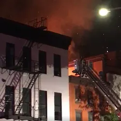 Three FDNY firefighters suffered minor injuries battling a three-alarm blaze in Manhattan's Chinatown section early Thursday.
