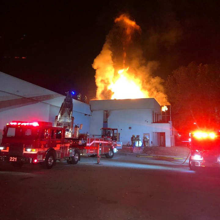 Two San Bernardino County, CA, firefighters were injured in blaze that partially collapsed a vacant two-story commercial building Tuesday.