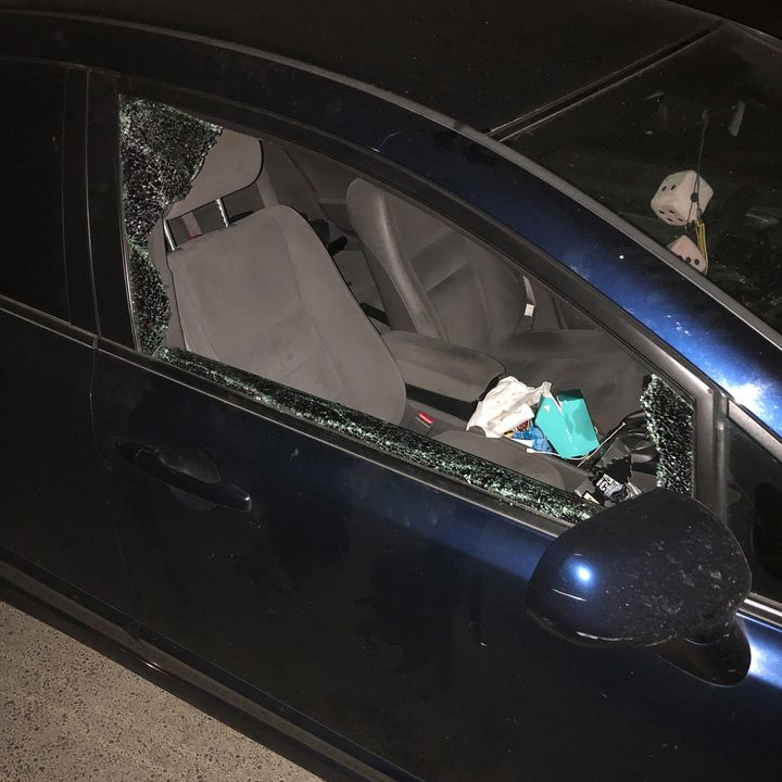 Three Selah, WA, firefighters had the windows of their vehicles smashed Wednesday while they battled the Evans Canyon Fire.