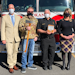 Pictured from left: Steve Danyluk, Boone Cutler, Spokane Fire Department Chief Brian Schaeffer, and Spokane Mayor Nadine Woodward.