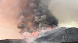 Firefighters watch as the El Dorado burns thousands of acres over the weekend.