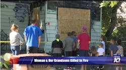 Neighbors gather at the scene after three people were killed in a Lansing house fire early Friday. Neighbors gather at the scene after three people were killed in a Lansing house fire early Friday.