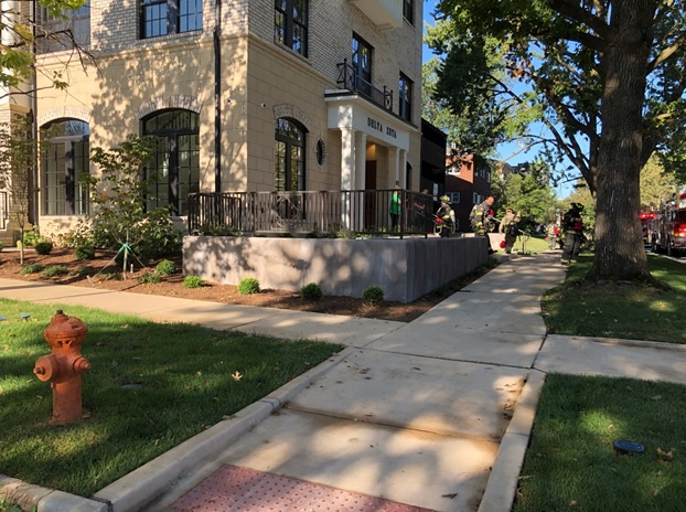 A four story lightweight single room occupancy type of building (sorority house) approximately 100 ft by 40ft. The structure houses forty students and features open stairs as well as lightweight roof trusses and engineered I-beams as flooring components. The engineered stone and brick veneer disguise the building&rsquo;s structural hazards.