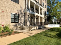 The fire department connection, remote from the main entrance and its closest fire hydrant. In this case, the FDC location was primarily determined by aesthetic considerations. The fire department connection, remote from the main entrance and its closest fire hydrant. In this case, the FDC location was primarily determined by aesthetic considerations.