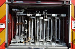 This nonquint, rear-mount aerial tower carries 260 feet of ground ladders, including: extension ladders of 28 feet, 35 feet (two) and 45 feet; 16- and 20-foot roof ladders; and right-side-body-nested 14-foot roof and 24-foot extension ladders. Careful planning is needed during the apparatus design process to provide sufficient ground ladder banking. This nonquint, rear-mount aerial tower carries 260 feet of ground ladders, including: extension ladders of 28 feet, 35 feet (two) and 45 feet; 16- and 20-foot roof ladders; and right-side-body-nested 14-foot roof and 24-foot extension ladders. Careful planning is needed during the apparatus design process to provide sufficient ground ladder banking.