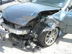 Figure 1. As you approach this sedan, you note an offset frontal crash and that the driver&rsquo;s door already is open. Start thinking about potential mechanism of injury possibilities for at least the driver prior to making patient contact.