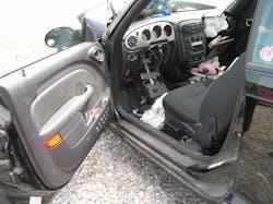 The driver&rsquo;s door of the convertible is open partially, the steering column with a deployed airbag is on the floorboard, and the instrument panel, A-pillar, floorboard and rocker appear undamaged. Also, there are no seat airbag IDs on the driver&rsquo;s seat, so you anticipate that this vehicle has no side-impact seat airbags. All of these are good size-up assessment points to note.