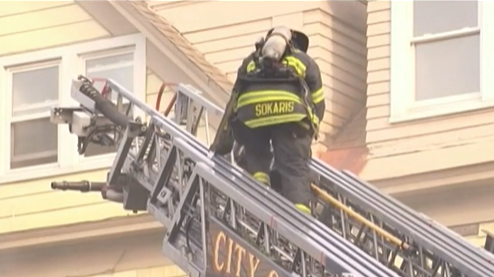 Albany, NY, firefighters battled a residential blaze Sunday that was ignited by an unattended candle.