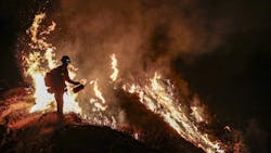 Firefighters battle the Bobcat Fire, north of Mount Wilson, CA, along Angeles Crest Highway on Sept. 22. Firefighters battle the Bobcat Fire, north of Mount Wilson, CA, along Angeles Crest Highway on Sept. 22.