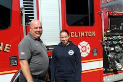 Kacie Ortiz, Clinton's newest firefighter, poses with Fire Chief Michael Lutes as she started as the first female to join the ranks. Kacie Ortiz, Clinton's newest firefighter, poses with Fire Chief Michael Lutes as she started as the first female to join the ranks.