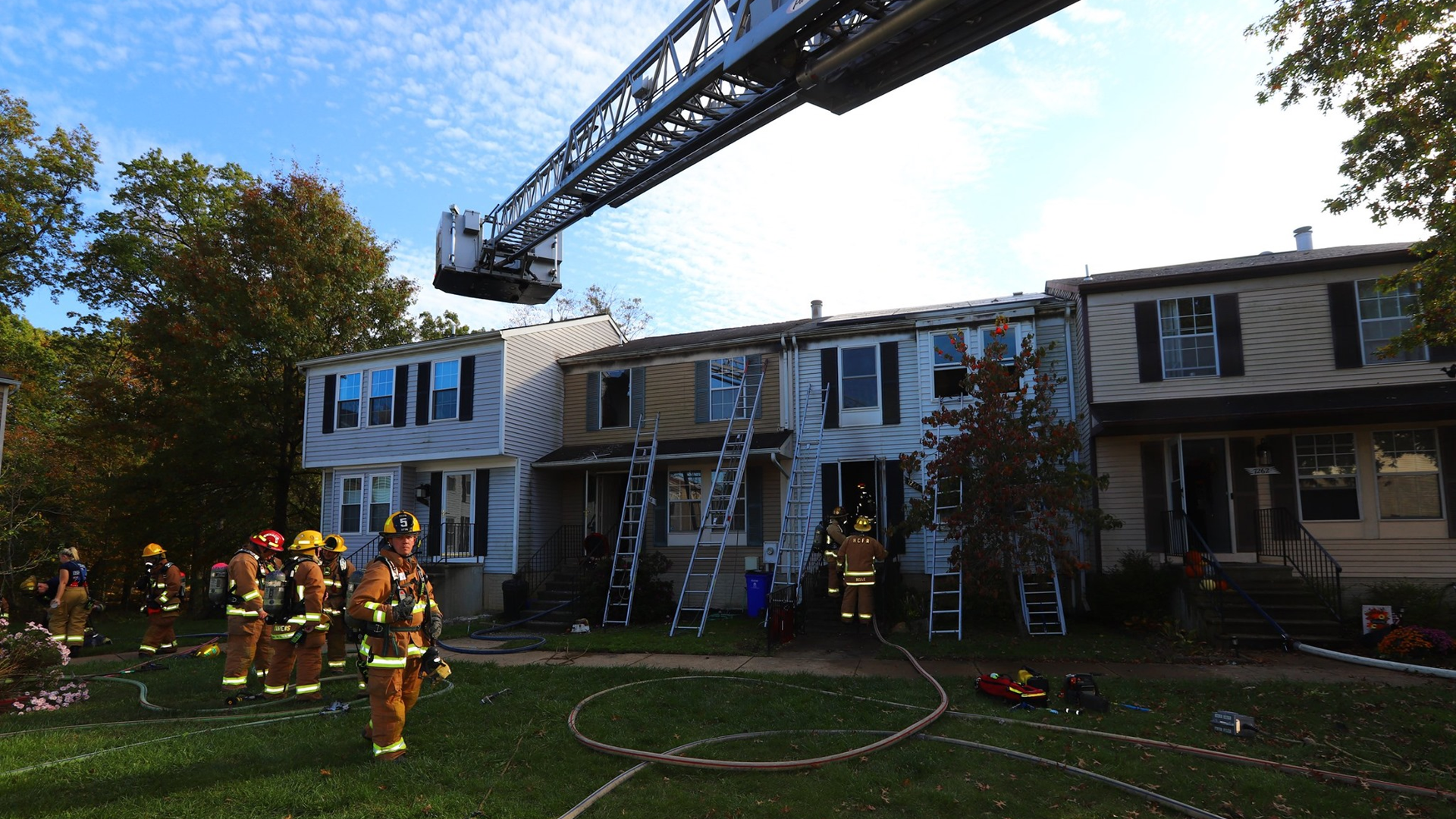 A Howard County, MD, firefighter was injured during a two-alarm townhouse blaze Friday.