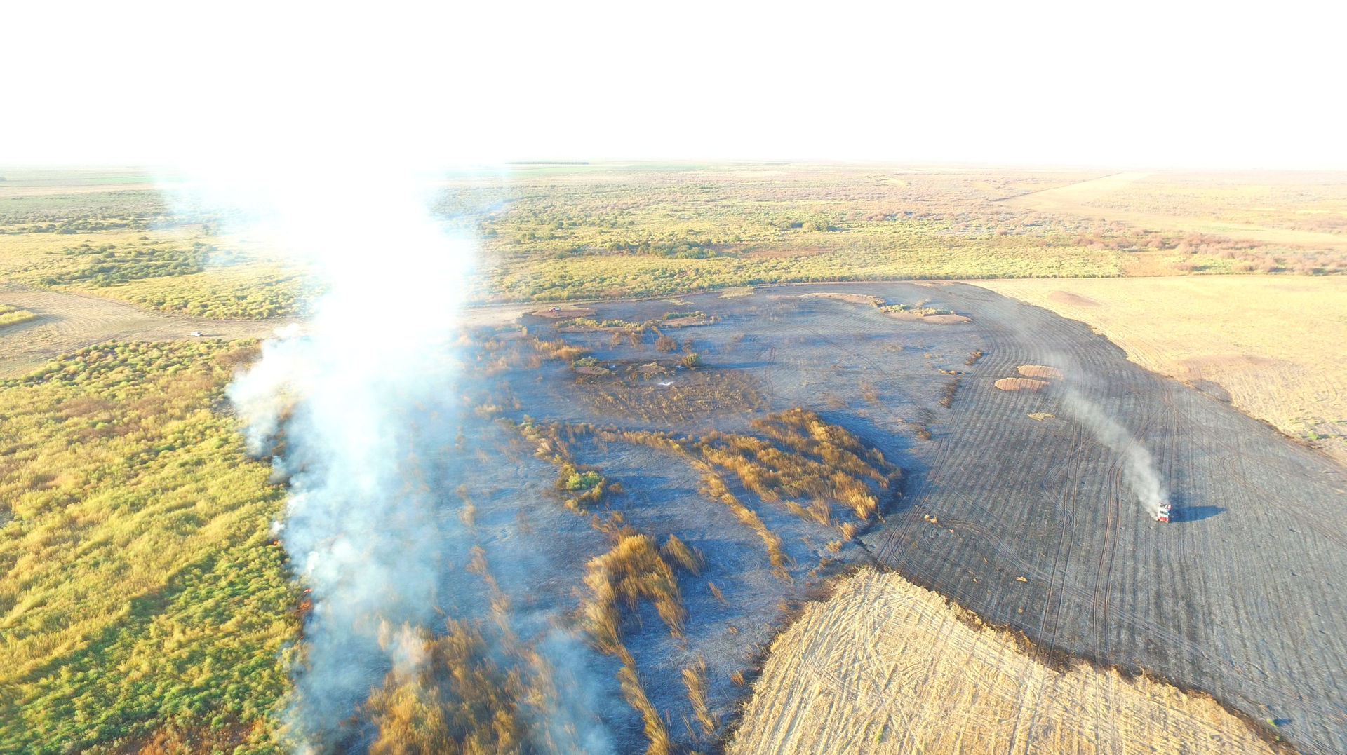 A photograph from an Artesia, NM, Police Department drone shows a major brush fire burning in the old Lake McMillan bed on Oct. 16. Seven Eddy County volunteer fire departments responded to the blaze along with Eddy County Fire Services.