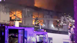 Firefighters from multiple departments battled a four-alarm blaze that erupted at a steel processing plant in Kenilworth late Saturday.