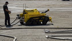 Los Angeles Fire Capt. Jason Ortiz control's the department's new RS3 firefighting robot Tuesday at the Frank Hotchkin Memorial Training Center. Los Angeles Fire Capt. Jason Ortiz control's the department's new RS3 firefighting robot Tuesday at the Frank Hotchkin Memorial Training Center.