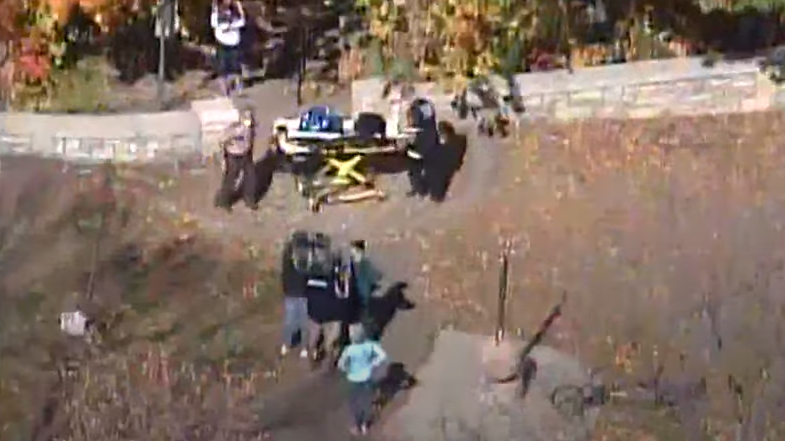 Two juveniles helped Minneapolis firefighters rescue a person who fell down a Mississippi River bluff Wednesday.