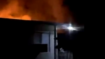 Nearly 40 Oakland, CA, firefighters battled a two-alarm blaze that broke out at a two-story apartment building Tuesday.