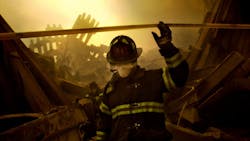 FDNY firefighters search through the rubble of the south tower of the World Trade Center in New York City on Sept. 11, 2001.