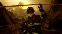 FDNY firefighters search through the rubble of the south tower of the World Trade Center in New York City on Sept. 11, 2001.