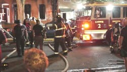 Two Trenton, NJ, firefighters were injured battling a three-alarm blaze early Saturday that tore through several buildings.