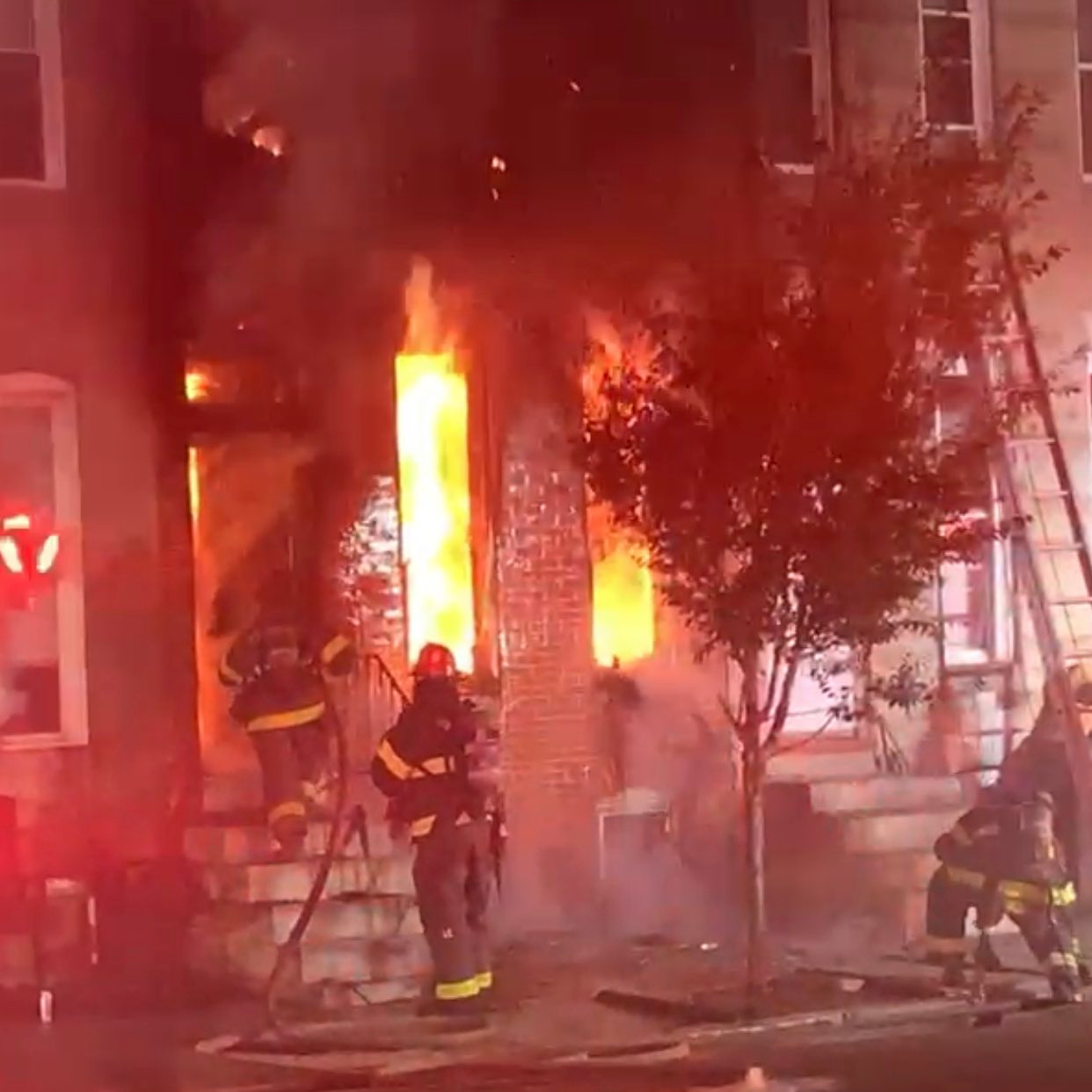 Two Baltimore City firefighters were injured during a blaze that broke out at a two-story rowhouse late Friday.
