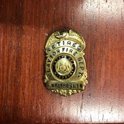 The retirement badge of Roy Weckherlin, the first fire marshal for Clayton, MO, was lost years ago in Florida. The retirement badge of Roy Weckherlin, the first fire marshal for Clayton, MO, was lost years ago in Florida.