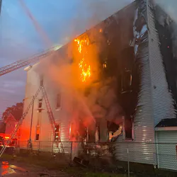 Boston firefighters battled a three-alarm blaze that broke out at a three-floor home in Dorchester on Friday.
