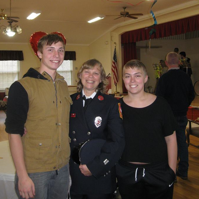 Patricia Hamann, center, with her two children.