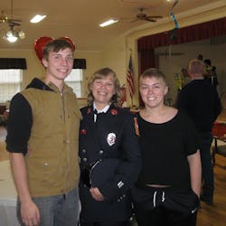 Patricia Hamann, center, with her two children. Patricia Hamann, center, with her two children.