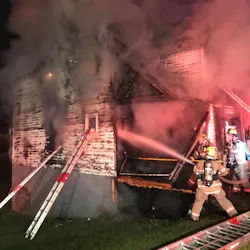 A Roanoke, VA, firefighter was injured by debris from a structure collapse during a residential blaze Saturday.