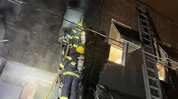 A firefighter was burned battling a blaze that erupted at a two-story row house in South Philadelphia on Sunday.