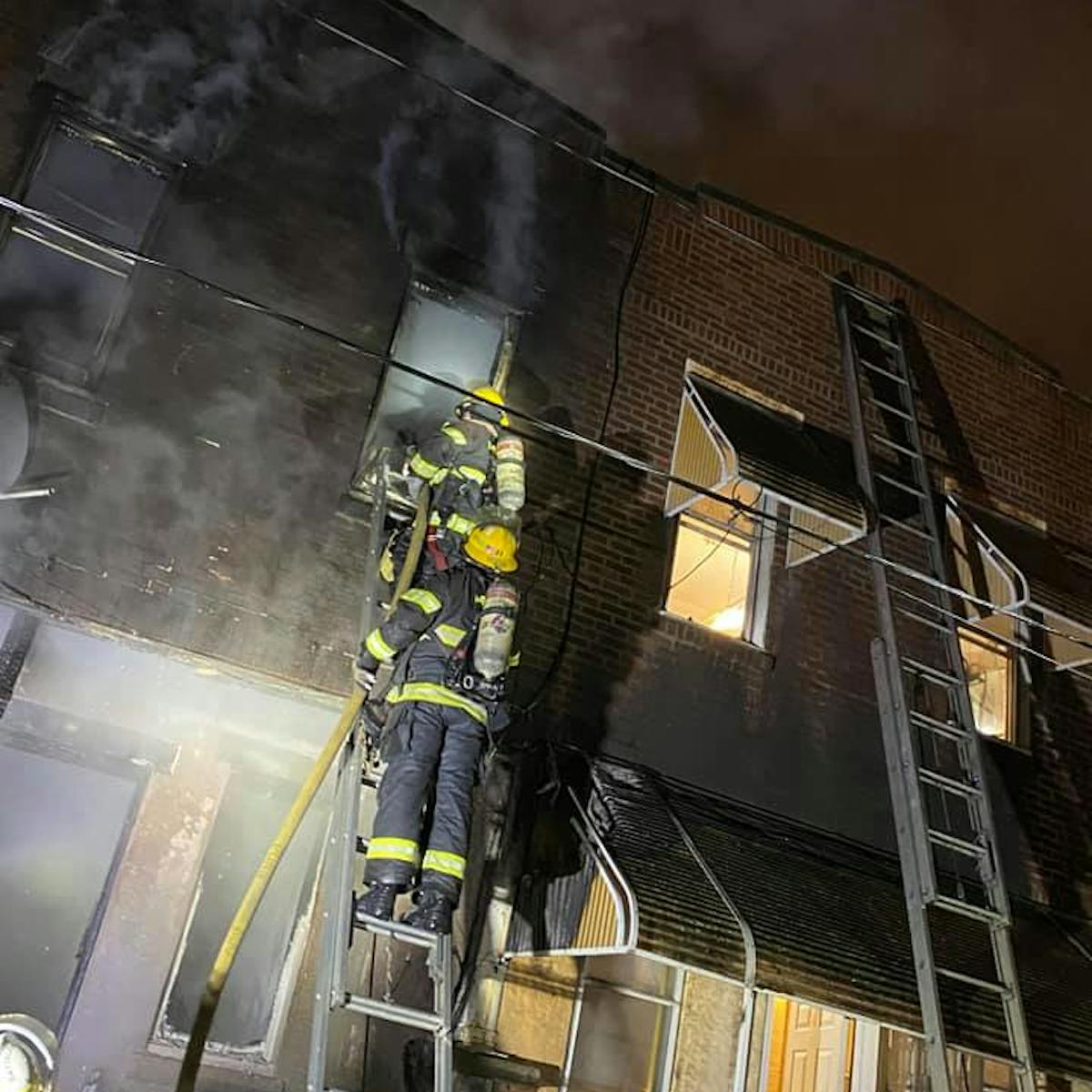 A firefighter was burned battling a blaze that erupted at a two-story row house in South Philadelphia on Sunday.