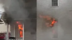 A Hanover, PA, firefighter suffered burns battling a house fire Wednesday.