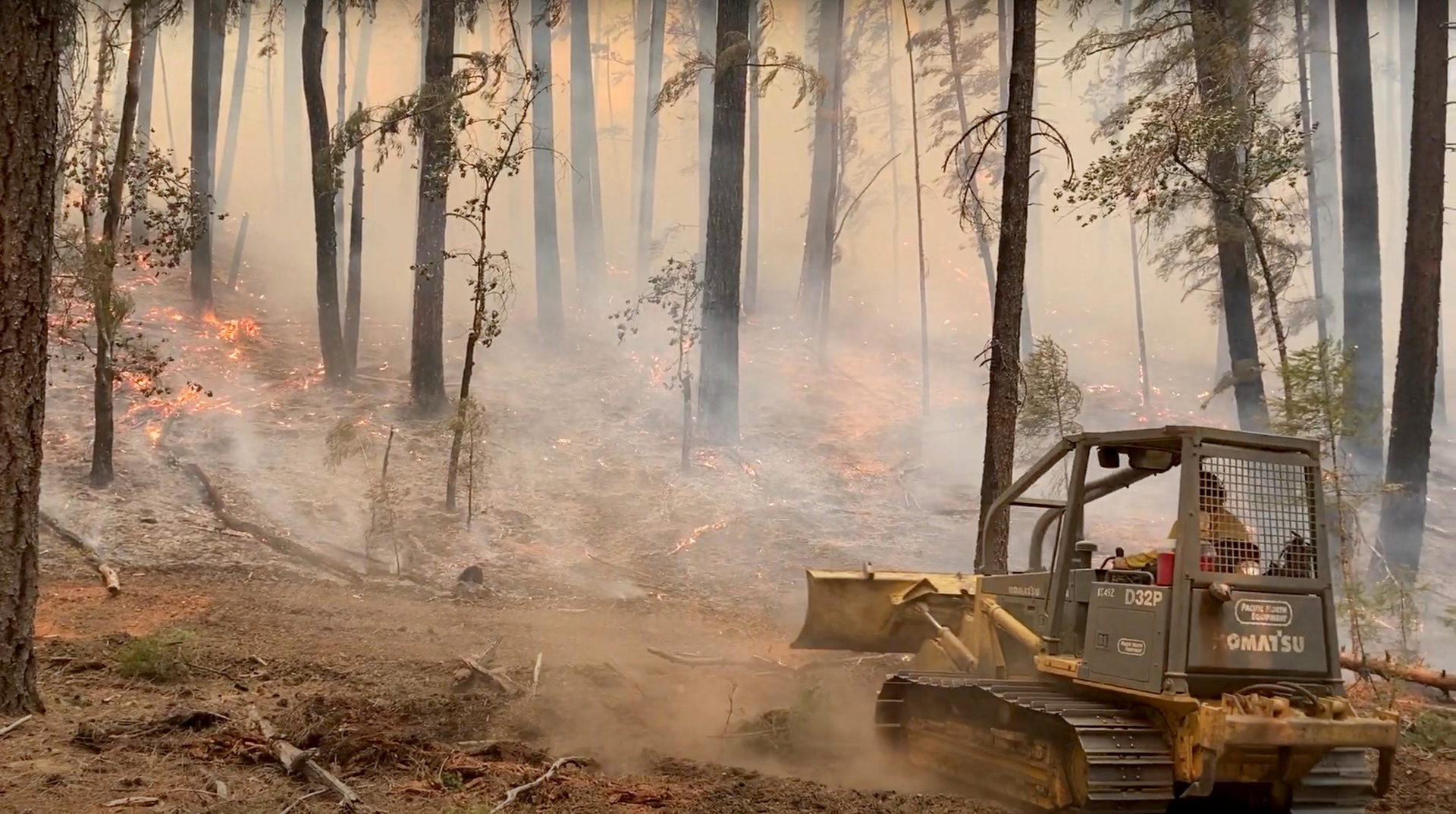 A dozer works to slow the fire near Ruth earlier this week.