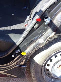 The striker plate (yellow arrow) can be seen much lower on the door structure than the horseshoe-shaped receiver mechanism (red arrow) for the safety latch. The striker plate (yellow arrow) can be seen much lower on the door structure than the horseshoe-shaped receiver mechanism (red arrow) for the safety latch.