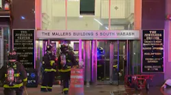 Two Chicago firefighters suffered from heat exhaustion while battling an extra-alarm blaze that broke out on the 10th floor of a 22-story commercial building in the Loop early Thursday.