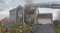 More than 50 volunteer firefighters battled a blaze that broke out a two-story Colonial home in the town of Clay on Sunday. More than 50 volunteer firefighters battled a blaze that broke out a two-story Colonial home in the town of Clay on Sunday.