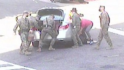 A group of Washington, D.C., Marines helped save a woman who was struck by and pinned beneath a car in an accident near the Marines Barracks on Nov. 7.