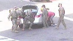 A group of Washington, D.C., Marines helped save a woman who was struck by and pinned beneath a car in an accident near the Marines Barracks on Nov. 7. A group of Washington, D.C., Marines helped save a woman who was struck by and pinned beneath a car in an accident near the Marines Barracks on Nov. 7.