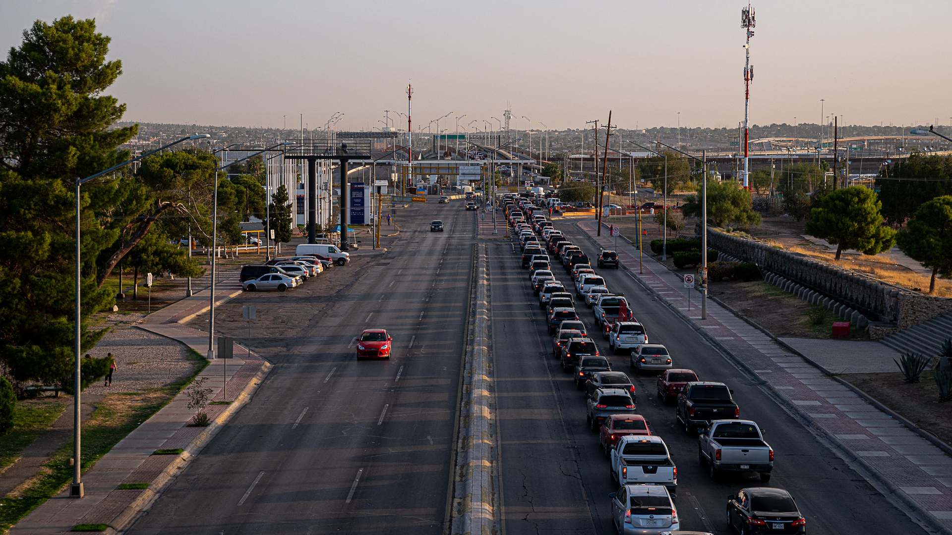 Thousands of vehicles wait to cross into the United States after sunrise in Ju&aacute;rez, Mexico, in September.