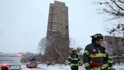 Minneapolis firefighters leave the scene of a fatal fire at a high-rise apartment building in 2019. Minneapolis firefighters leave the scene of a fatal fire at a high-rise apartment building in 2019.