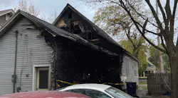 Two firefighters were injured battling a residential blaze in Holland, MI, on Sunday.