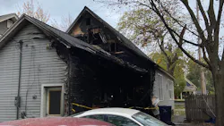 Two firefighters were injured battling a residential blaze in Holland, MI, on Sunday.
