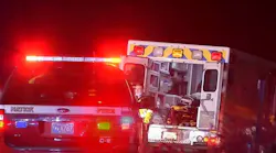 A Vital Ambulance carrying a patient was struck by a car that was speeding in the wrong direction along the Massachusetts Turnpike in Natick early Wednesday.