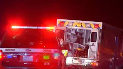 A Vital Ambulance carrying a patient was struck by a car that was speeding in the wrong direction along the Massachusetts Turnpike in Natick early Wednesday.