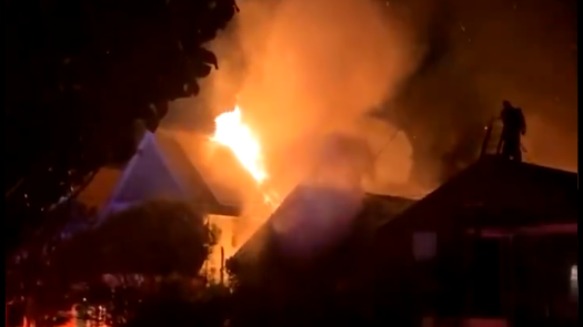 A San Francisco firefighter was injured battling a three-alarm garage fire in the Noe Valley neighborhood early Wednesday.