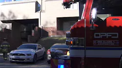 Overland Park, KS, firefighters forced their way inside a burning second-floor apartment Tuesday to rescue two unconscious boys, one who was rushed to the hospital in critical condition.